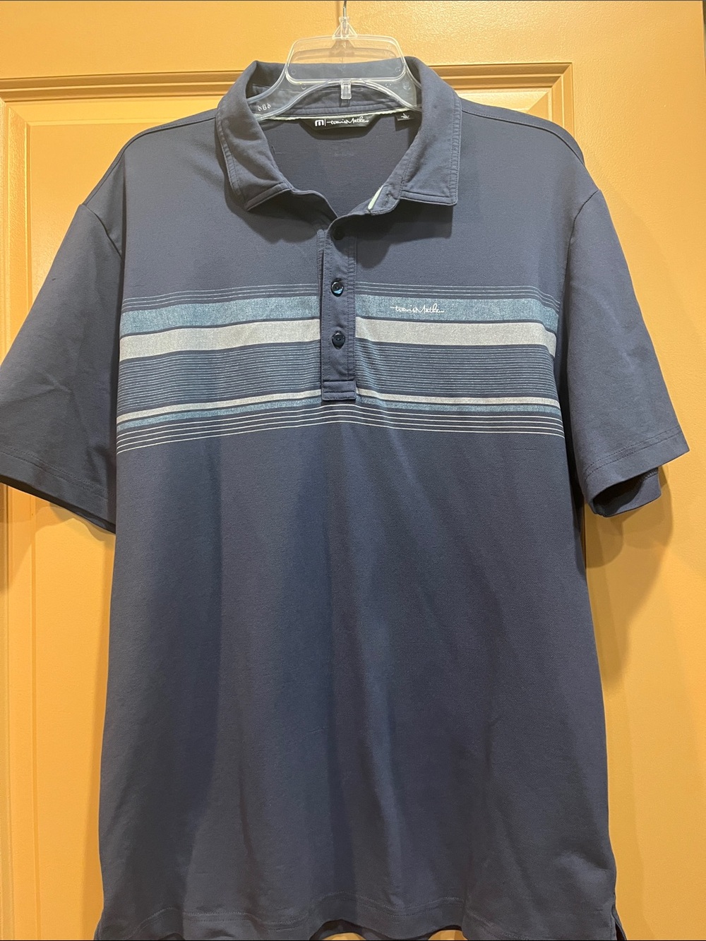 Travis Mathew Men's Navy Polo with Light Blue and Gray Stripe Detail Large